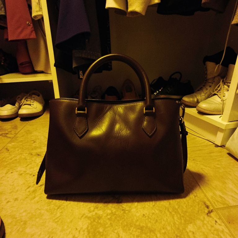 Dark closet to terracotta drape — before