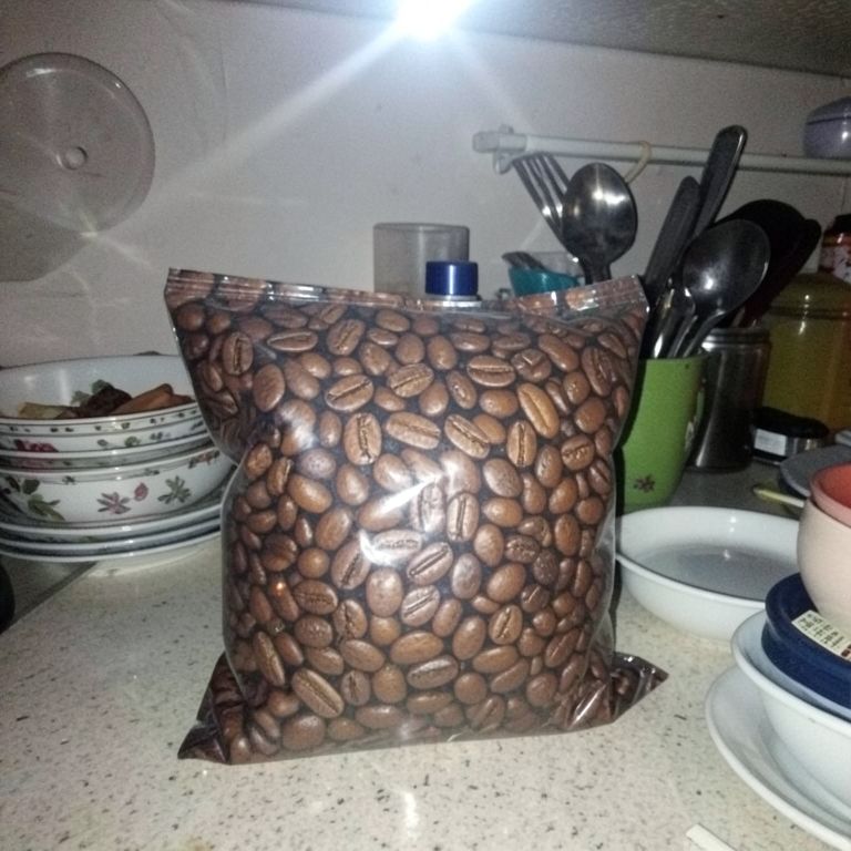 Kitchen clutter to amber wood scene — before